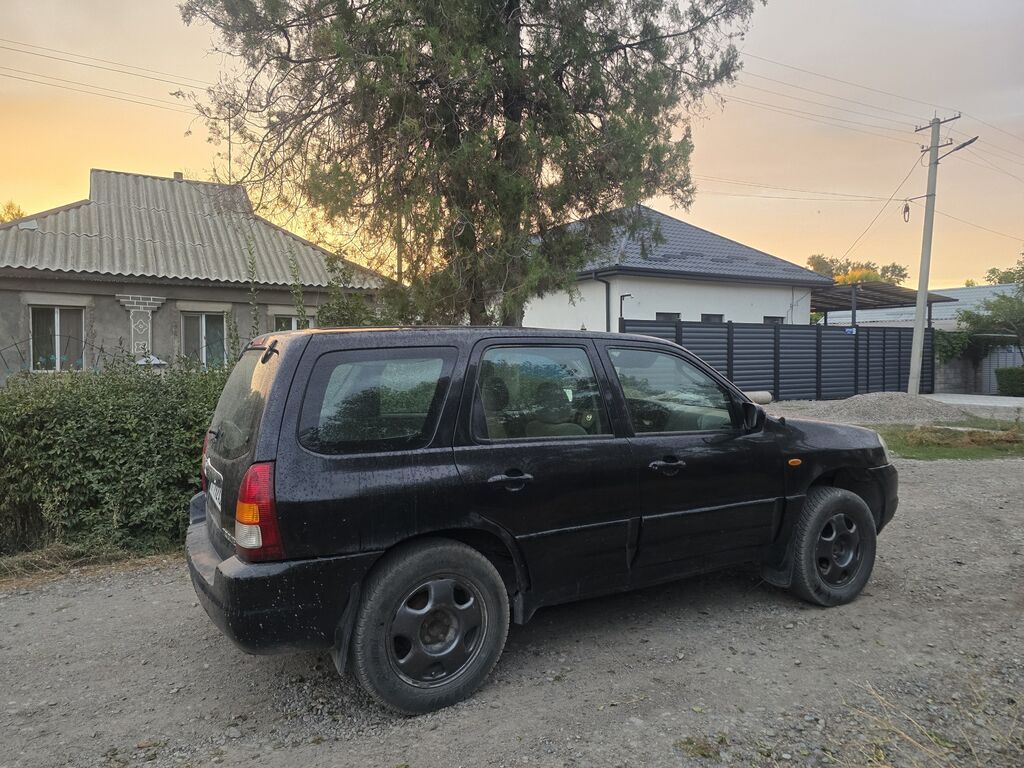 Mazda Tribute: 2000 г., 2 л, Механика, Газ, Кроссовер: фото 3