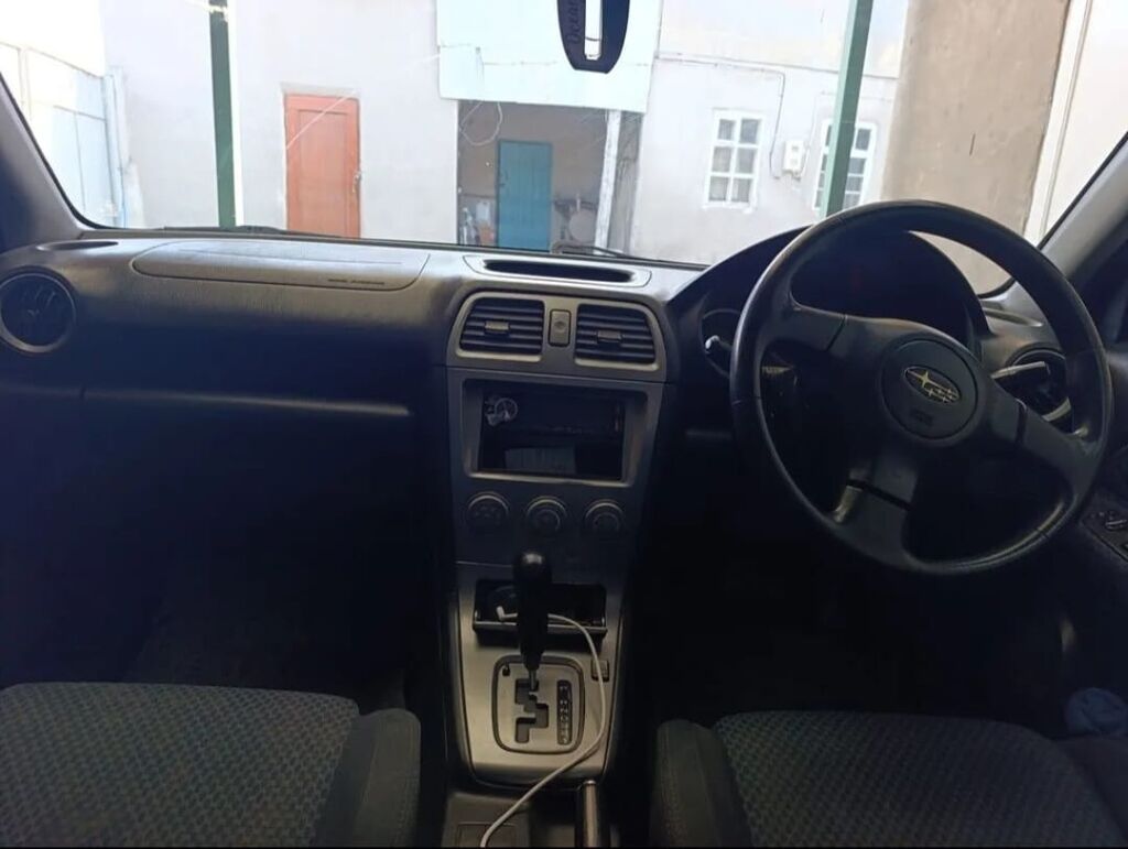 Subaru Impreza: 2004 г., 1.5 л, Автомат, Бензин, Универсал: фото 2