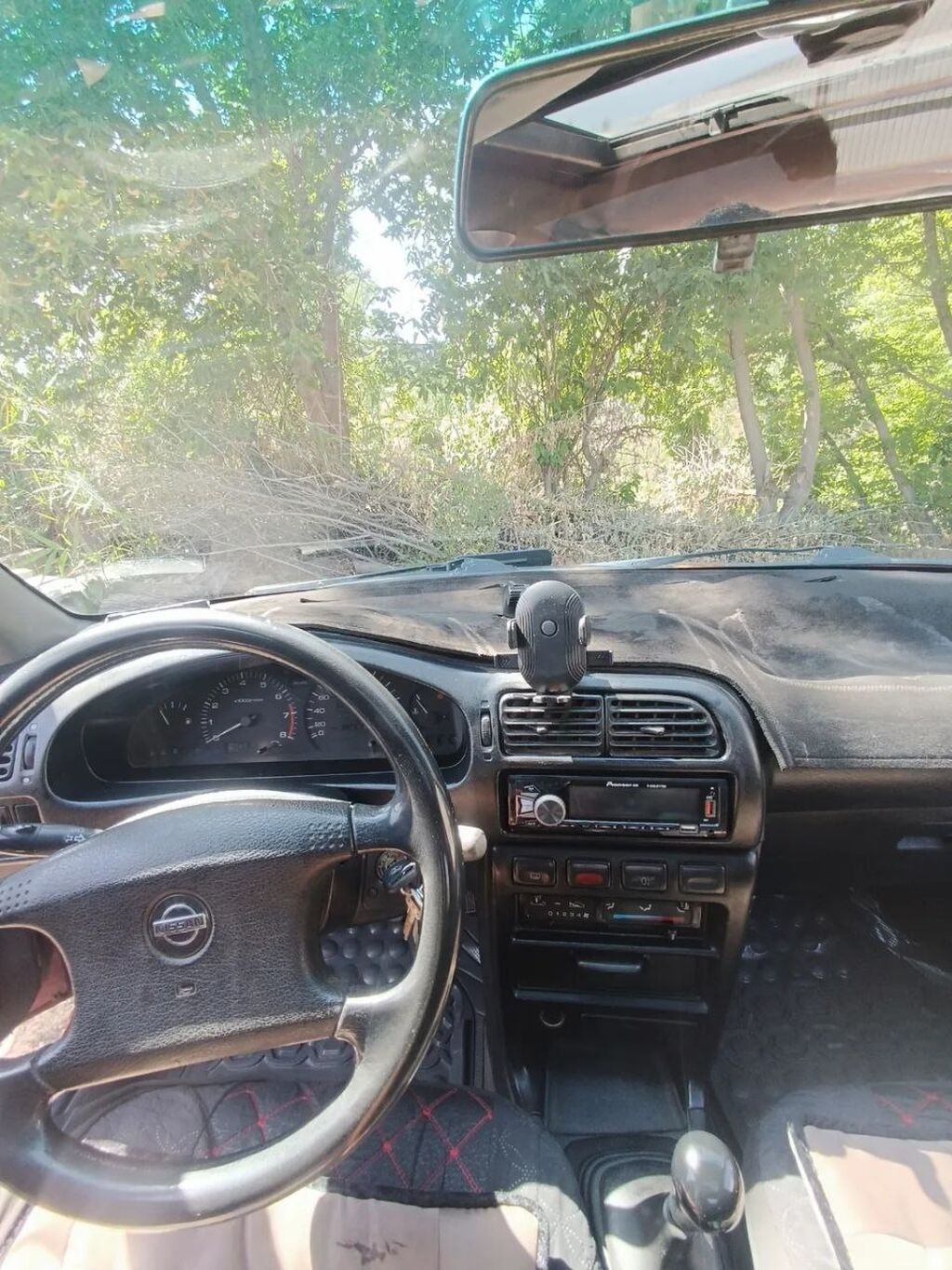 Nissan Sunny: 1991 г., 1.6 л, Механика, Бензин, Седан — фото 5
