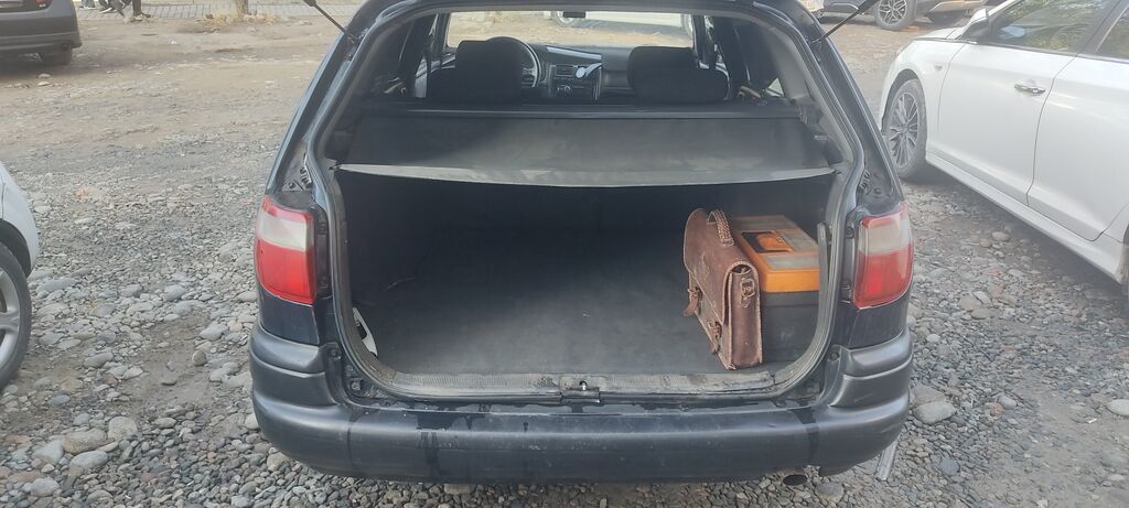 Toyota Carina E: 1998 г., 1.8 л, Механика, Газ, Универсал: фото 5