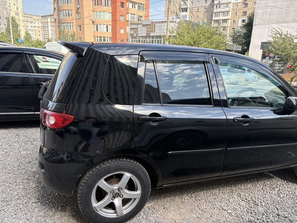 Mazda Demio: 2005 г., 1.3 л, Автомат, Хэтчбэк: фото 7