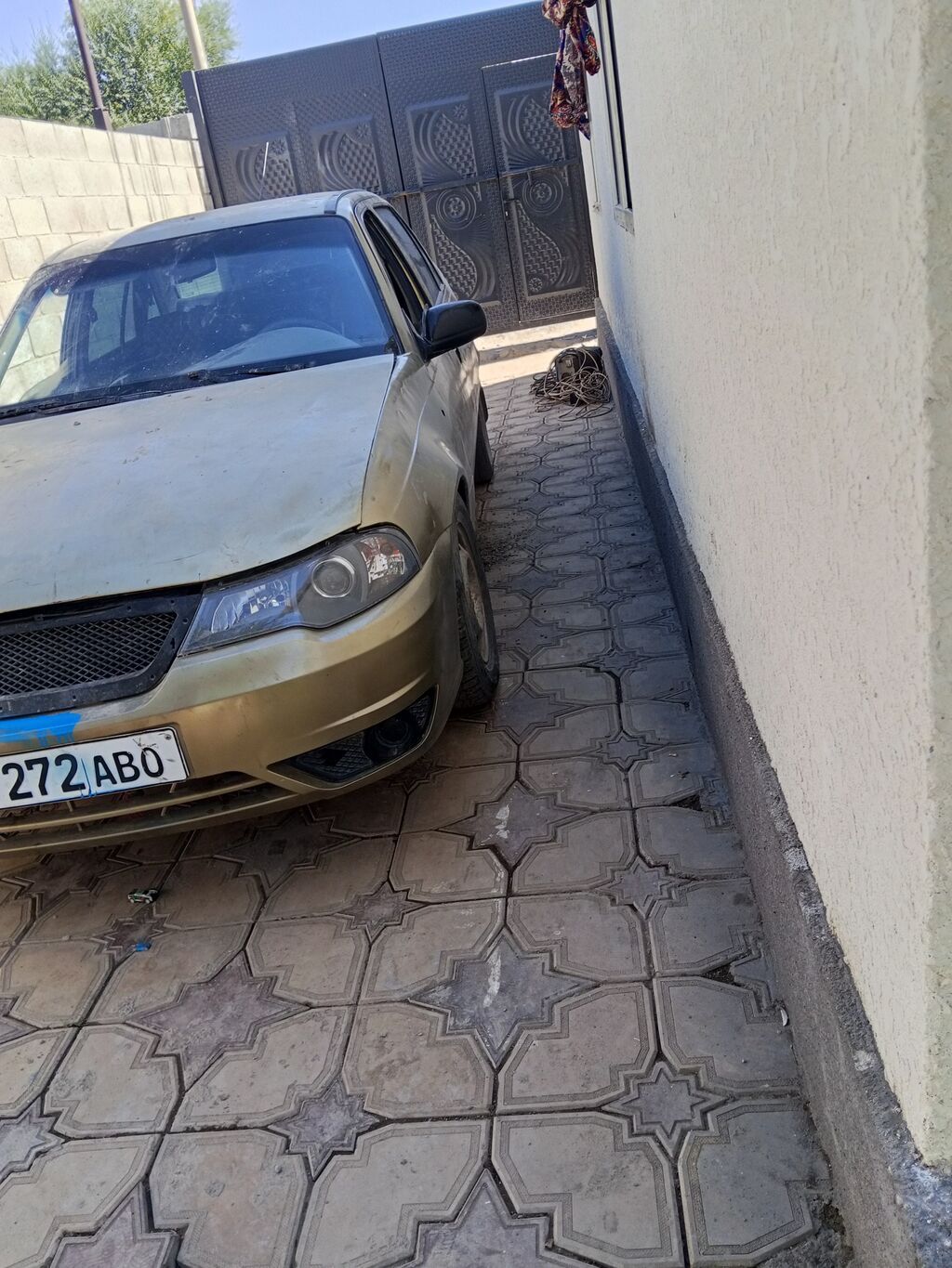 Daewoo Nexia: 2010 г., Механика, Седан: фото 1