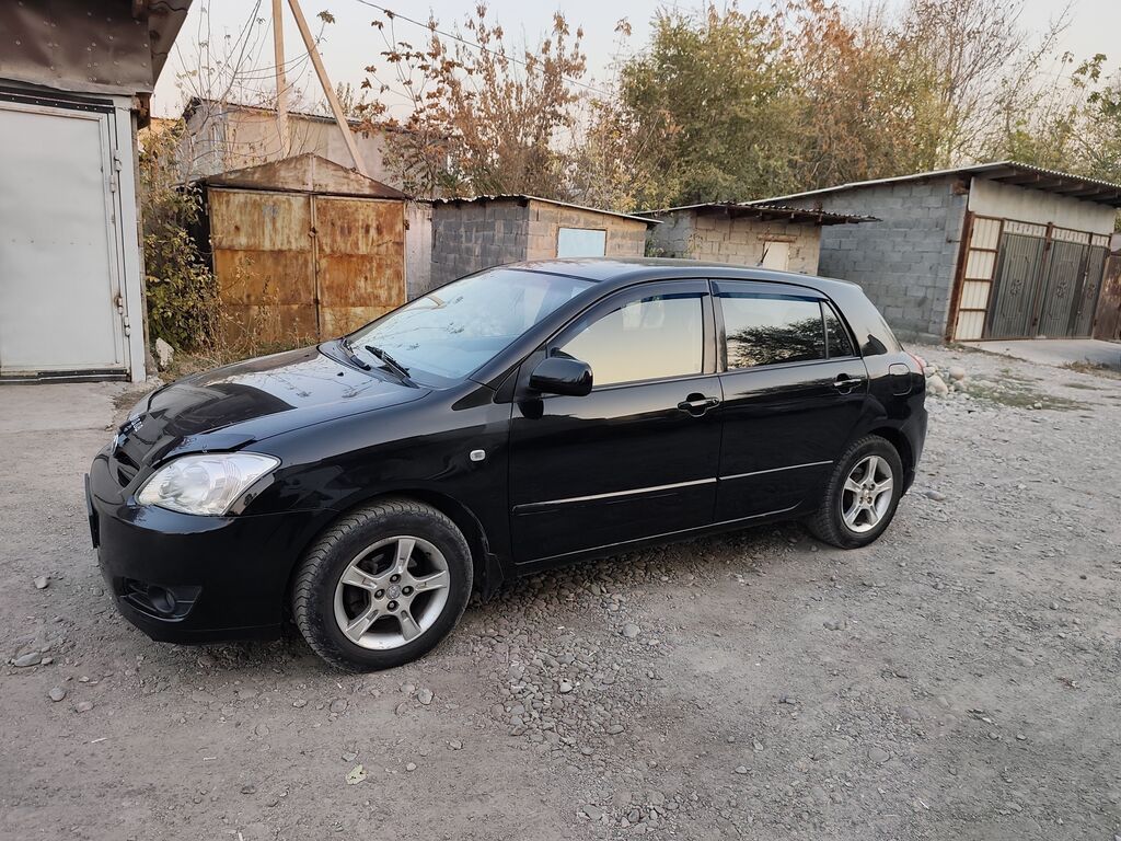 Toyota Corolla: 2005 г., 1.6 л, Автомат, Бензин, Хэтчбэк: фото 7