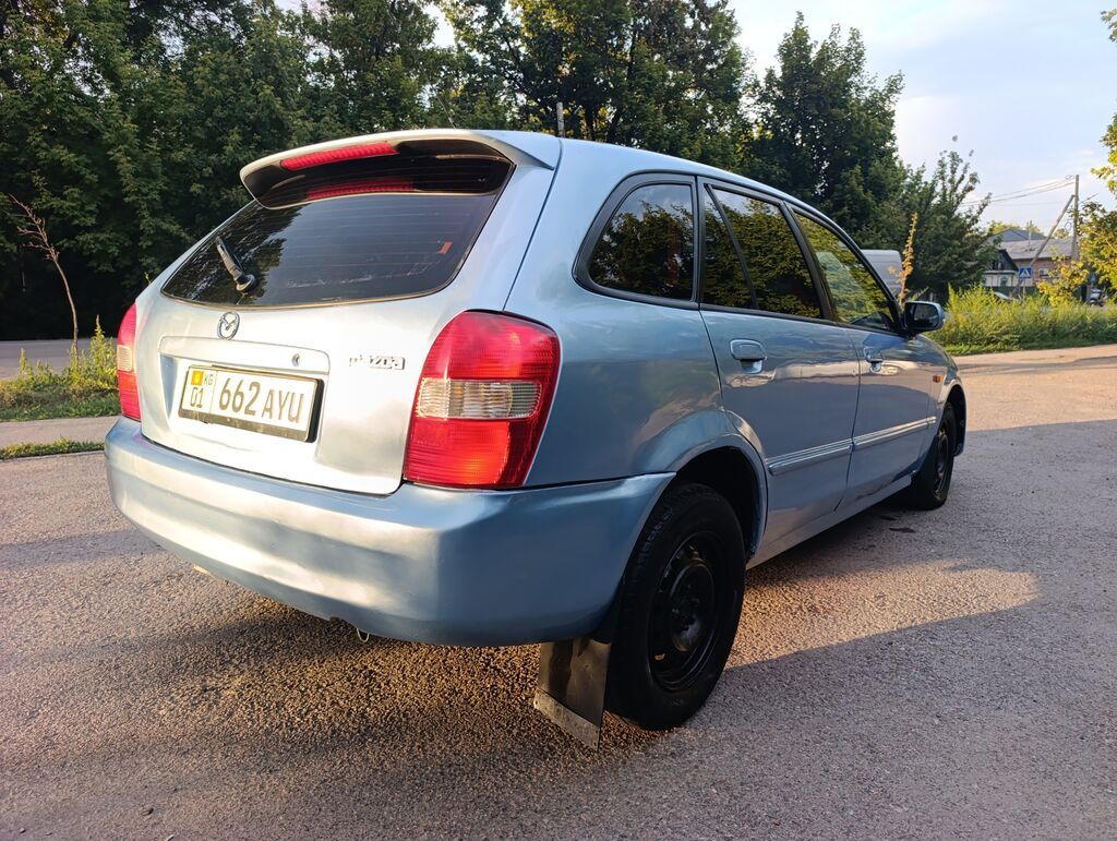Mazda 323: 2003 г., 1.6 л, Механика, Бензин, Универсал: фото 5