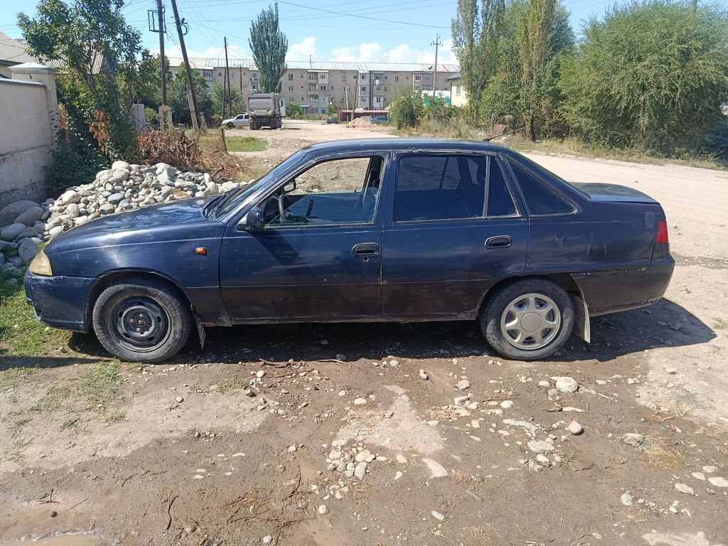 Daewoo Nexia: 2008 г., 1.5 л, Механика, Седан: фото 3