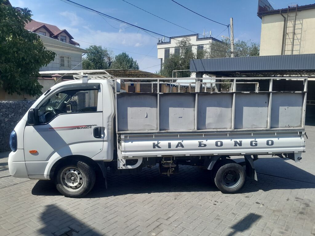 KIA Bongo III — легкий грузовик с открытым бортом. Основные: фото 2