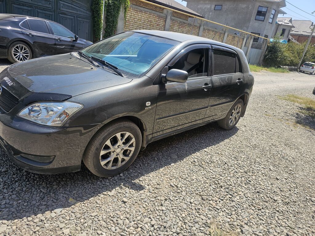Toyota Corolla: 2004 г., 1.6 л, Автомат, Бензин, Хэтчбэк: фото 2