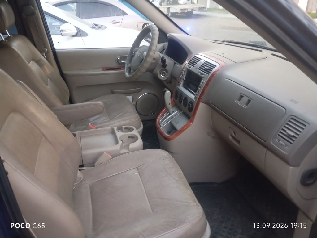 Kia Carnival: 2004 г., Автомат, Минивэн: фото 4