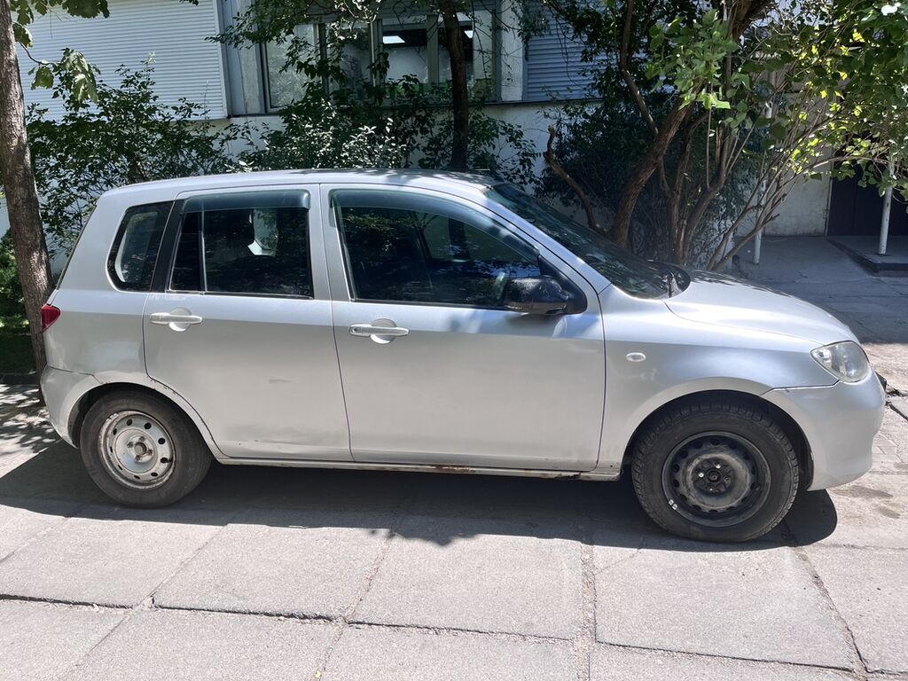 Mazda Demio: 2004 г., 1.3 л, Автомат, Бензин, Хэтчбэк: фото 8
