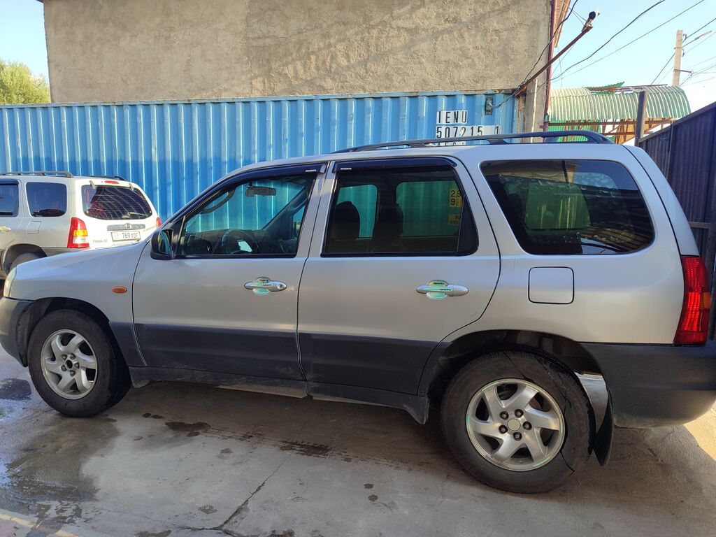 Mazda Tribute: 2002 г., 2 л, Механика, Бензин, Кроссовер: фото 2