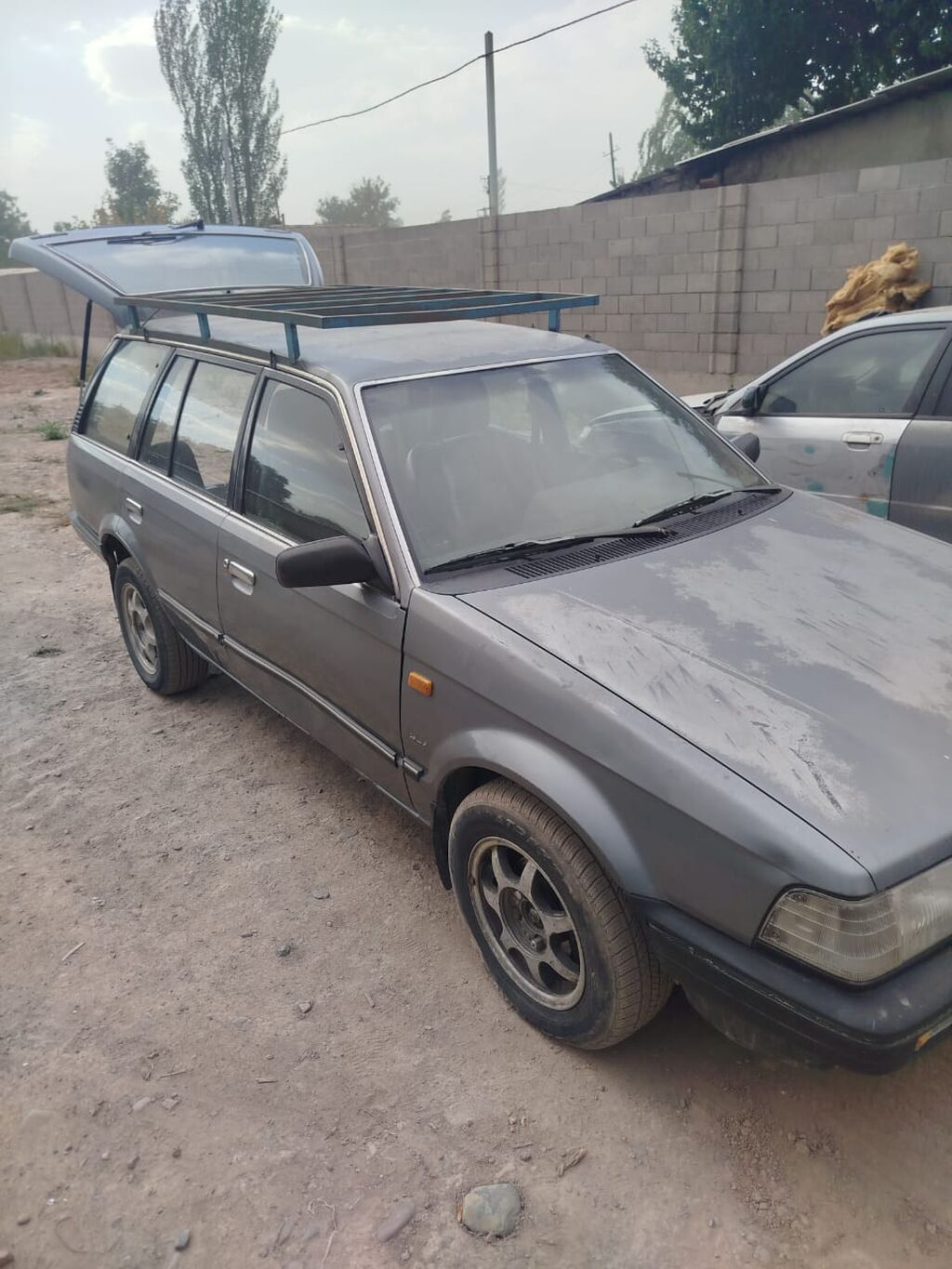 Mazda 323: 1990 г., Бензин, Универсал: фото 3