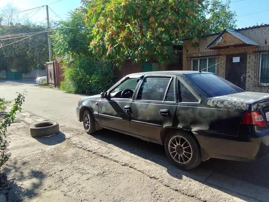Daewoo Nexia: 2012 г., 1.6 л, Механика, Седан: фото 5