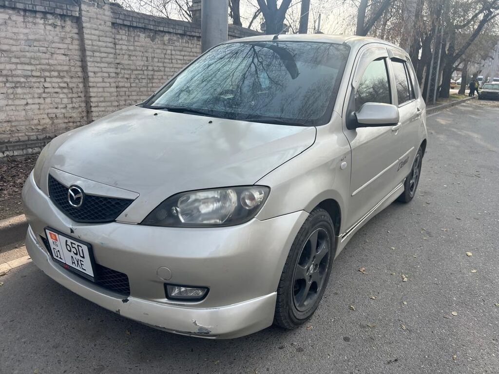 Mazda Demio: 2003 г., 1.3 л, Автомат, Бензин, Хэтчбэк: фото 7