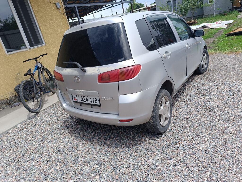 Mazda Demio: 2002 г., 1.3 л, Автомат, Бензин, Универсал: фото 3
