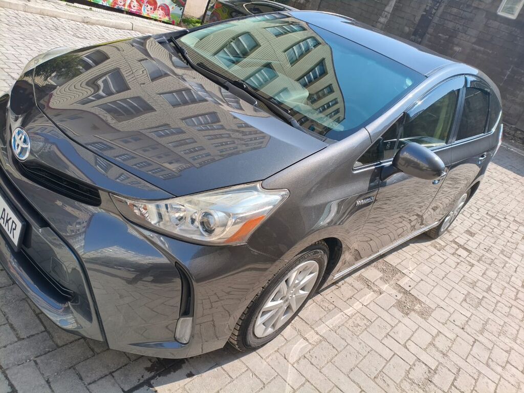 Toyota Prius V: 2014 г., 1.8 л, Вариатор, Гибрид, Универсал: фото 2