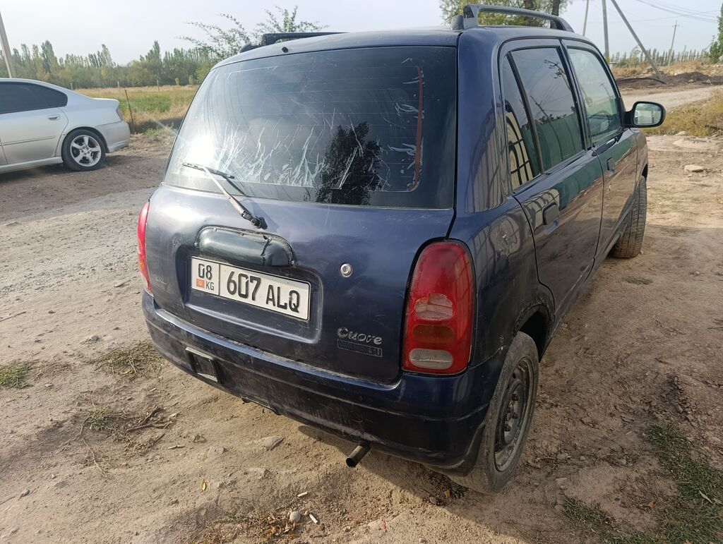 Daihatsu Cuore: 2003 г., 1 л, Механика, Бензин, Универсал: фото 2