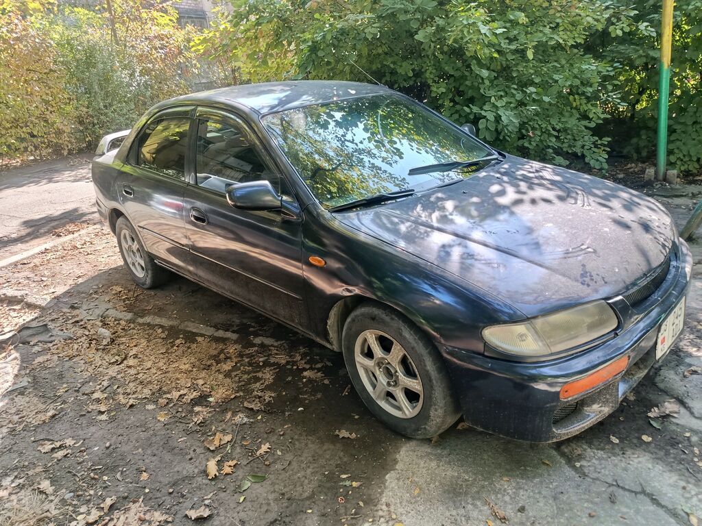Mazda 323, седан, приблизительно конец 1990‑х – начало 2000‑х годов: фото 8