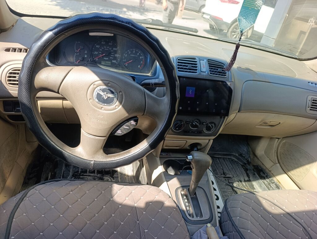 Mazda 323: 2002 г., 1.6 л, Автомат, Бензин, Седан: фото 5