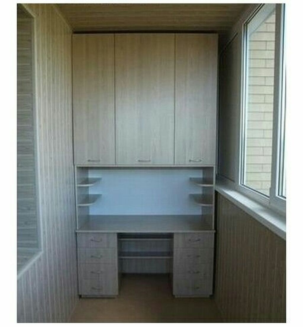 Шкаф на балконе со столом