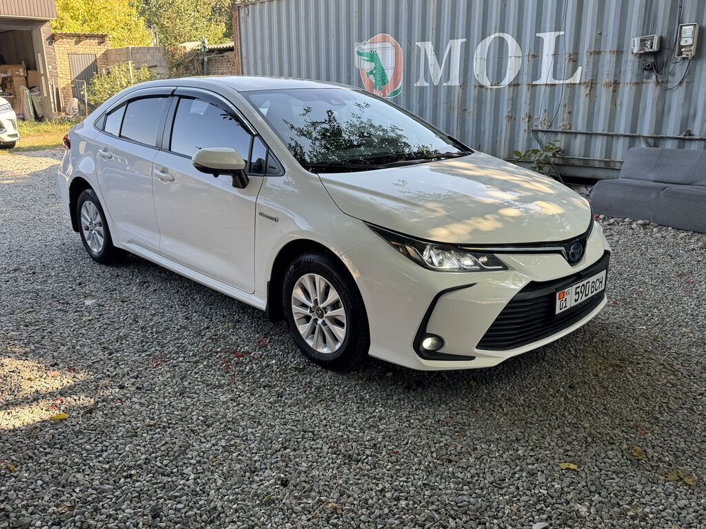 Toyota Corolla: 2021 г., 1.8 л, Вариатор, Гибрид, Седан: фото 1