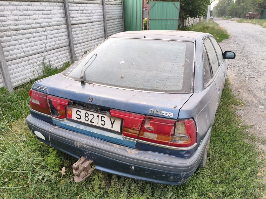 Mazda 626: 1990 г., Седан: фото 2