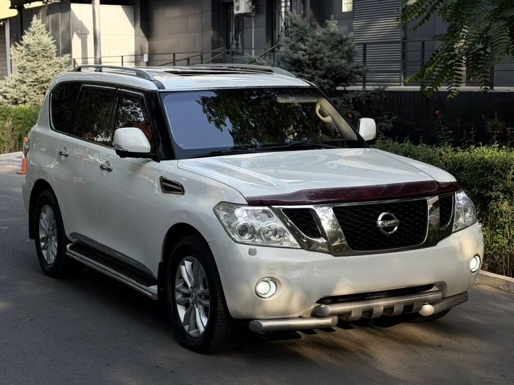 Nissan Patrol: 2014 г., 3 л, Автомат, Бензин, Внедорожник — фото 1