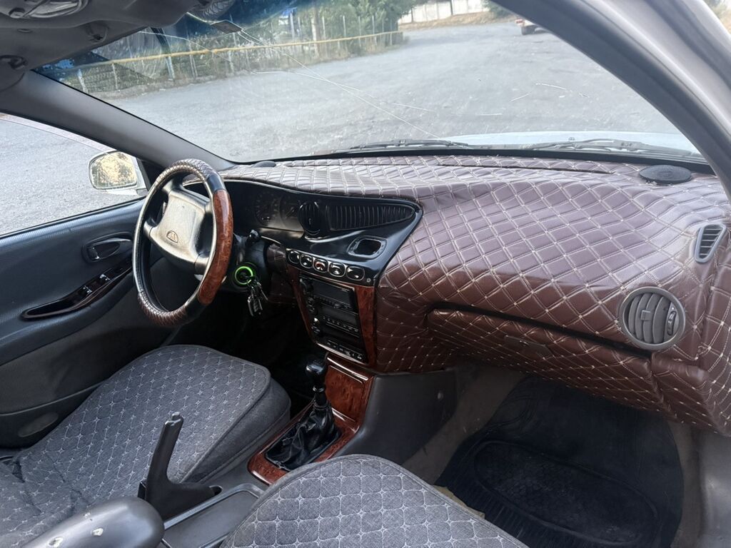 Daewoo Leganza: 1997 г., 1.8 л, Механика, Бензин, Седан — фото 5