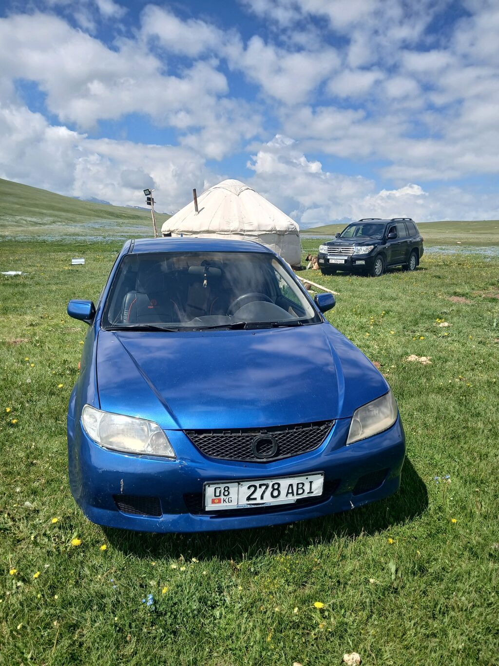Mazda 323: 2003 г., 1.6 л, Механика, Бензин, Седан: фото 1