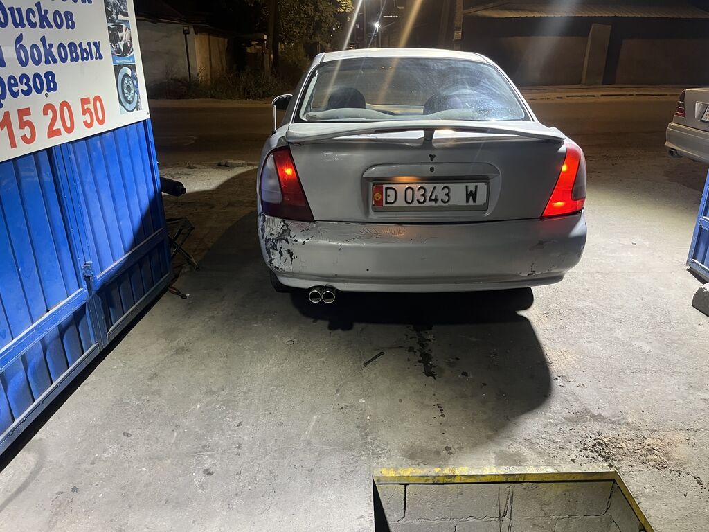 Daewoo Nubira: 2002 г., 1.8 л, Механика, Бензин, Седан: фото 8