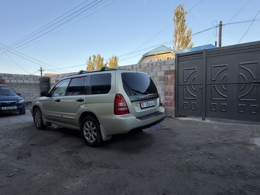 Subaru Forester: 2004 г., 2.5 л, Автомат, Бензин, Универсал: фото 2