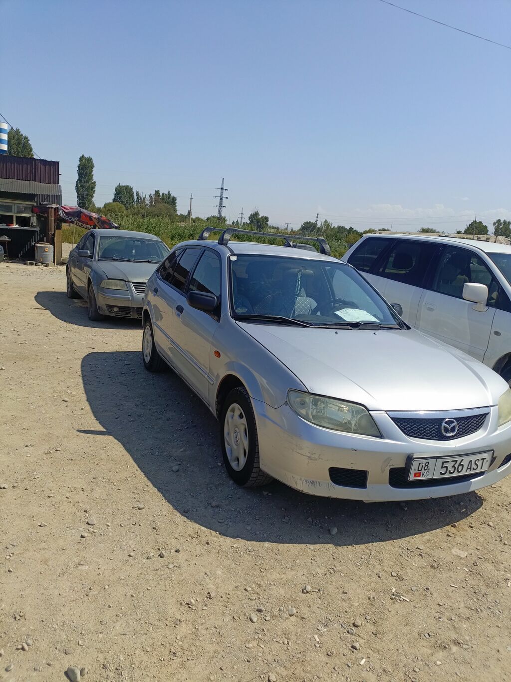 Mazda 323: 2002 г., Механика, Бензин, Универсал: фото 2