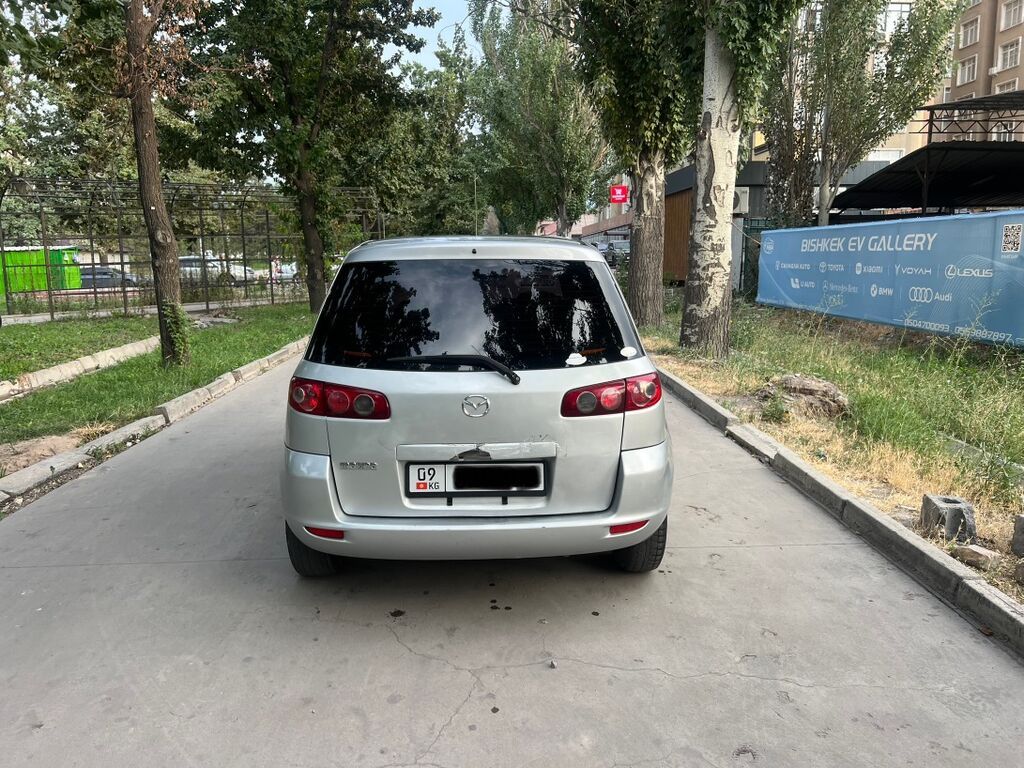 Mazda Demio: 2004 г., 1.3 л, Автомат, Бензин, Хэтчбэк: фото 6