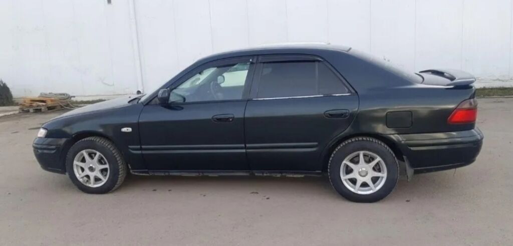 Mazda Capella: 1997 г., 2 л, Автомат, Бензин, Седан: фото 4