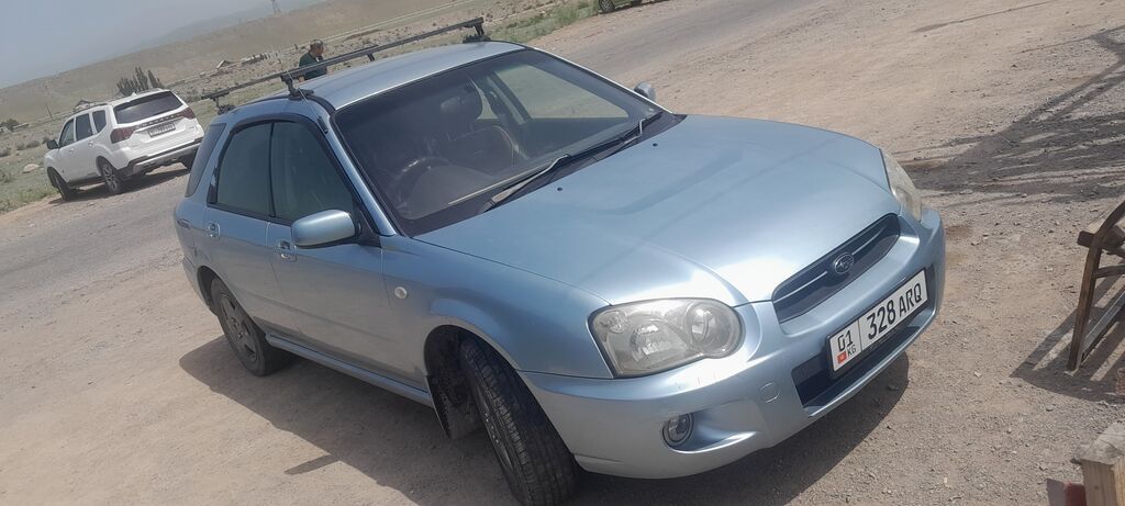 Subaru Impreza: 2004 г., Бензин, Универсал: фото 3