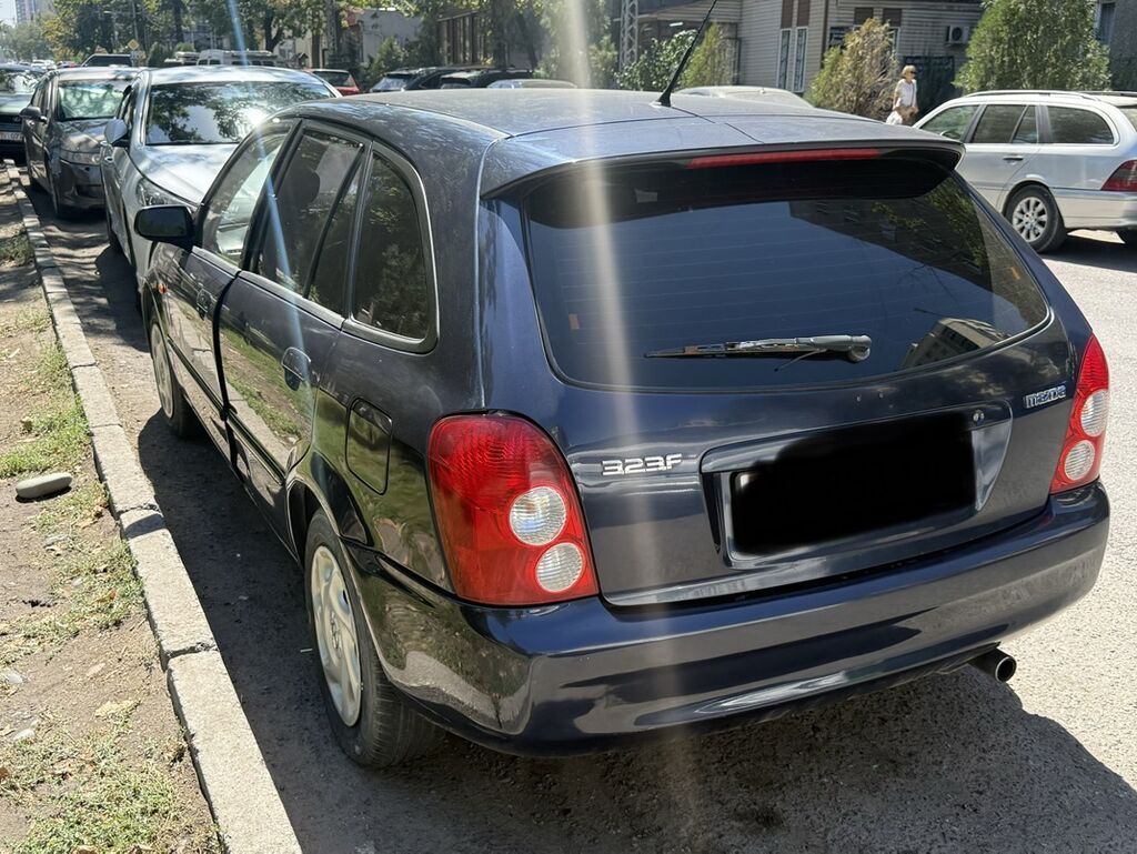 Mazda 323: 2002 г., 1.6 л, Механика, Бензин, Хэтчбэк: фото 4