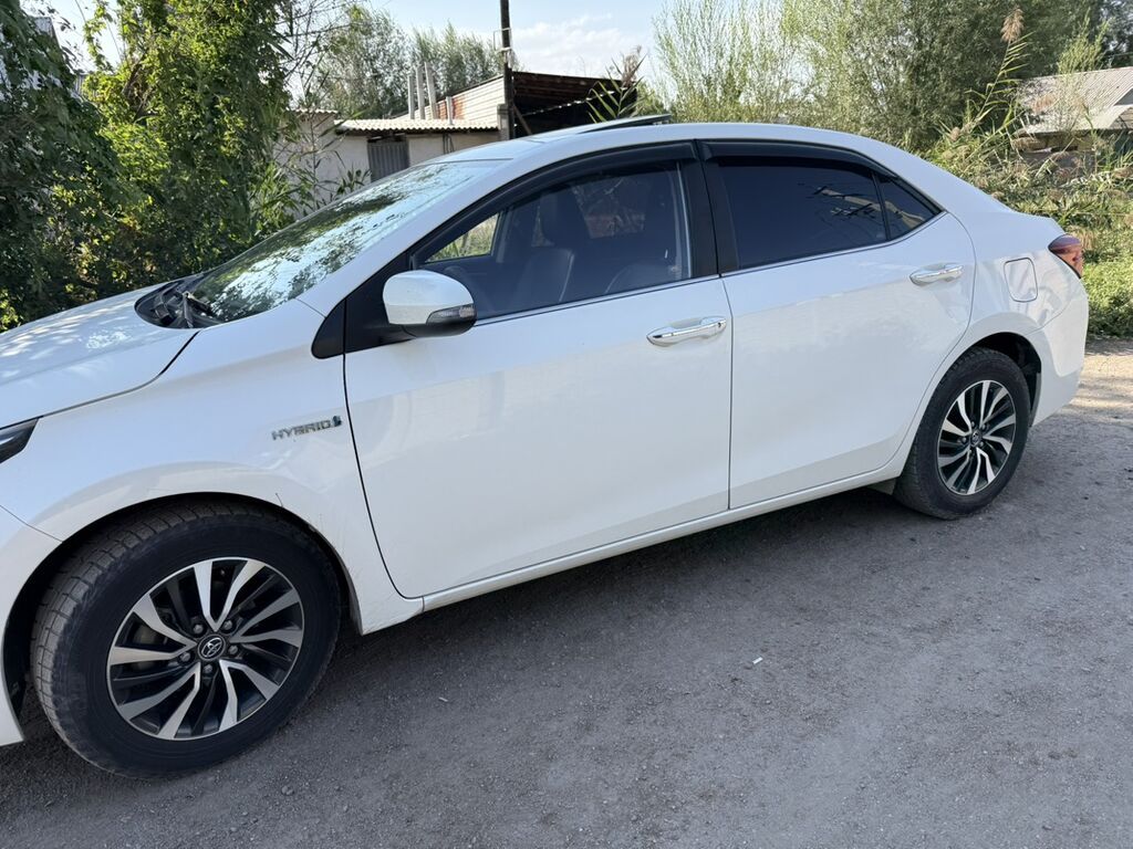 Toyota Corolla: 2019 г., 1.8 л, Гибрид, Седан: фото 4