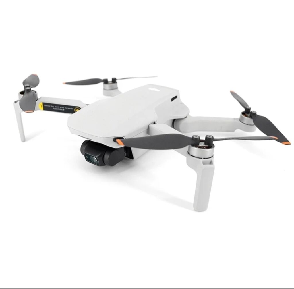 Квадрокоптер 10. Дрон DJI Mini 2. Дрон DJI Ultra Light 249g. Квадрокоптер DJI Mini 2 Fly more Combo. DJI Mini se Drone FCC.