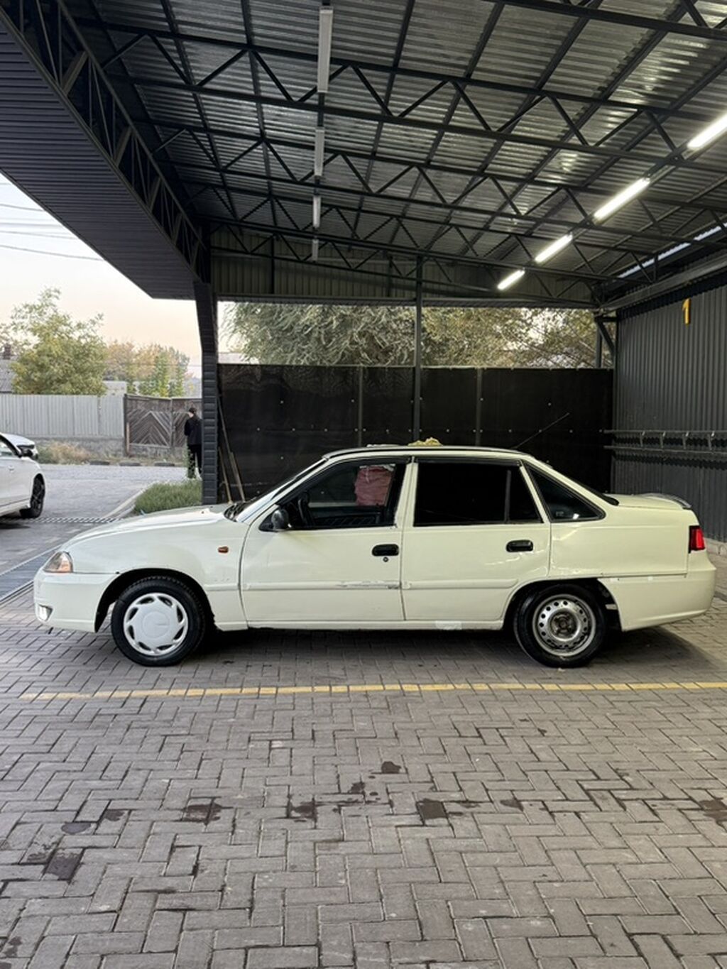 Daewoo Nexia: 2012 г., 1.5 л, Механика, Бензин, Седан: фото 2