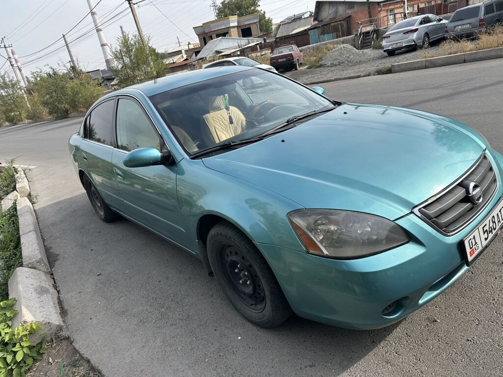 Nissan Altima: 2001 г., 2.5 л, Автомат, Газ, Седан: фото 2