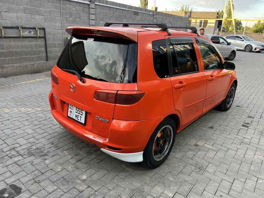 Mazda Demio: 2003 г., 1.3 л, Автомат, Бензин, Хэтчбэк — фото 3