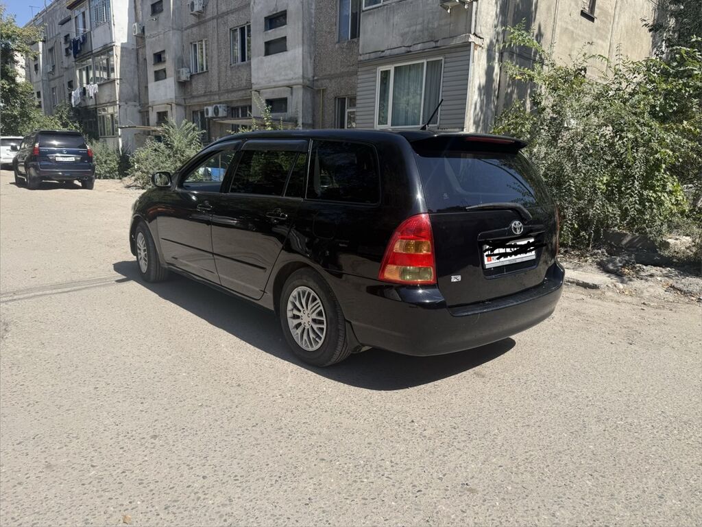 Toyota Corolla: 2003 г., 1.5 л, Автомат, Бензин, Универсал: фото 3