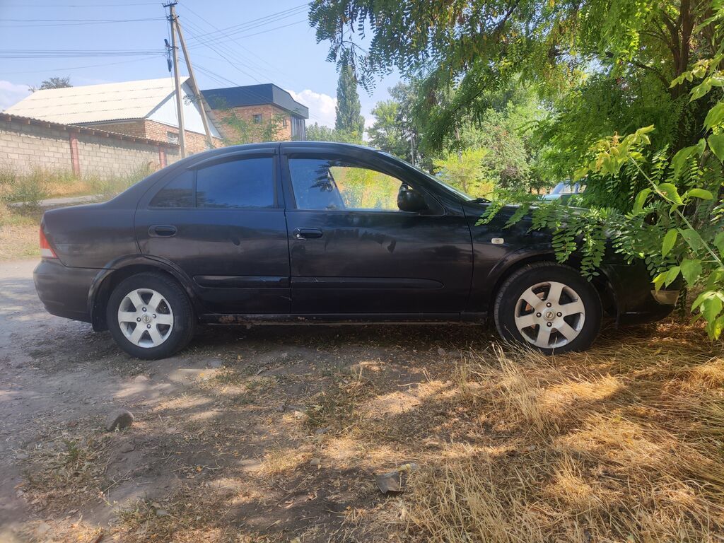 Nissan Almera Classic: 2009 г., 1.8 л, Автомат, Бензин: фото 6