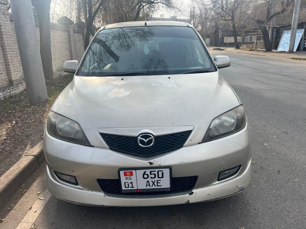 Mazda Demio: 2003 г., 1.3 л, Автомат, Бензин, Хэтчбэк: фото 6