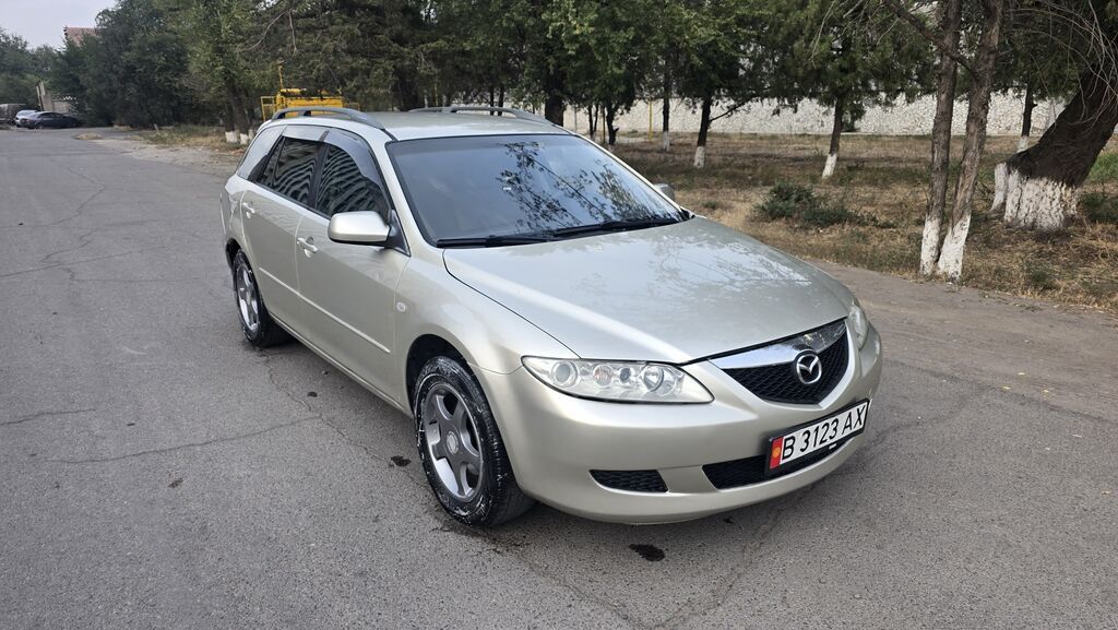 Mazda 6: 2003 г., 2 л, Автомат, Бензин, Универсал: фото 3