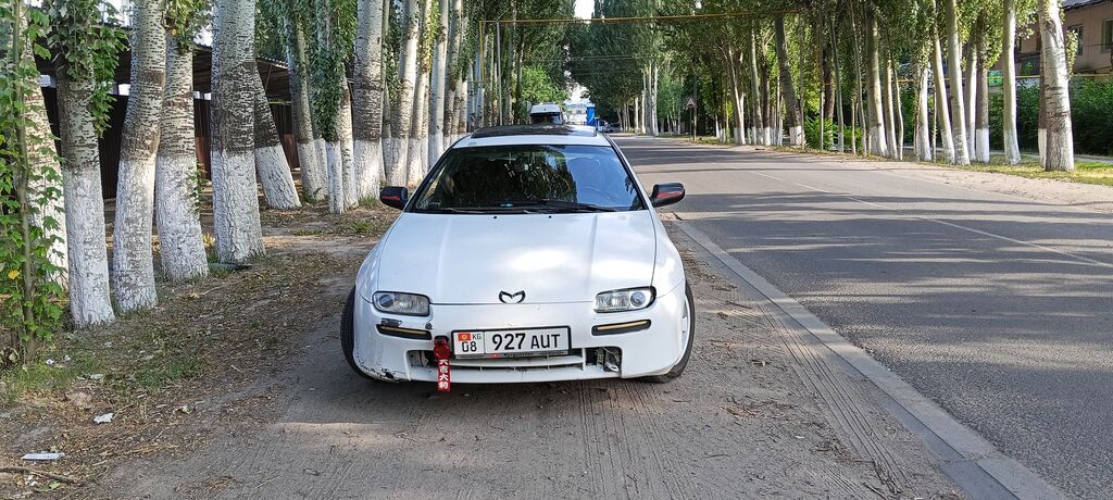 Mazda MX-6: 1994 г., 1.6 л, Механика, Бензин, Лифтбек: фото 2