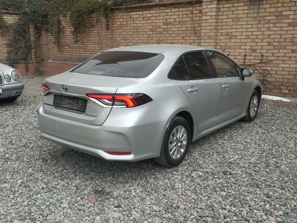 Toyota Corolla: 2021 г., 1.8 л, Вариатор, Гибрид, Седан: фото 5
