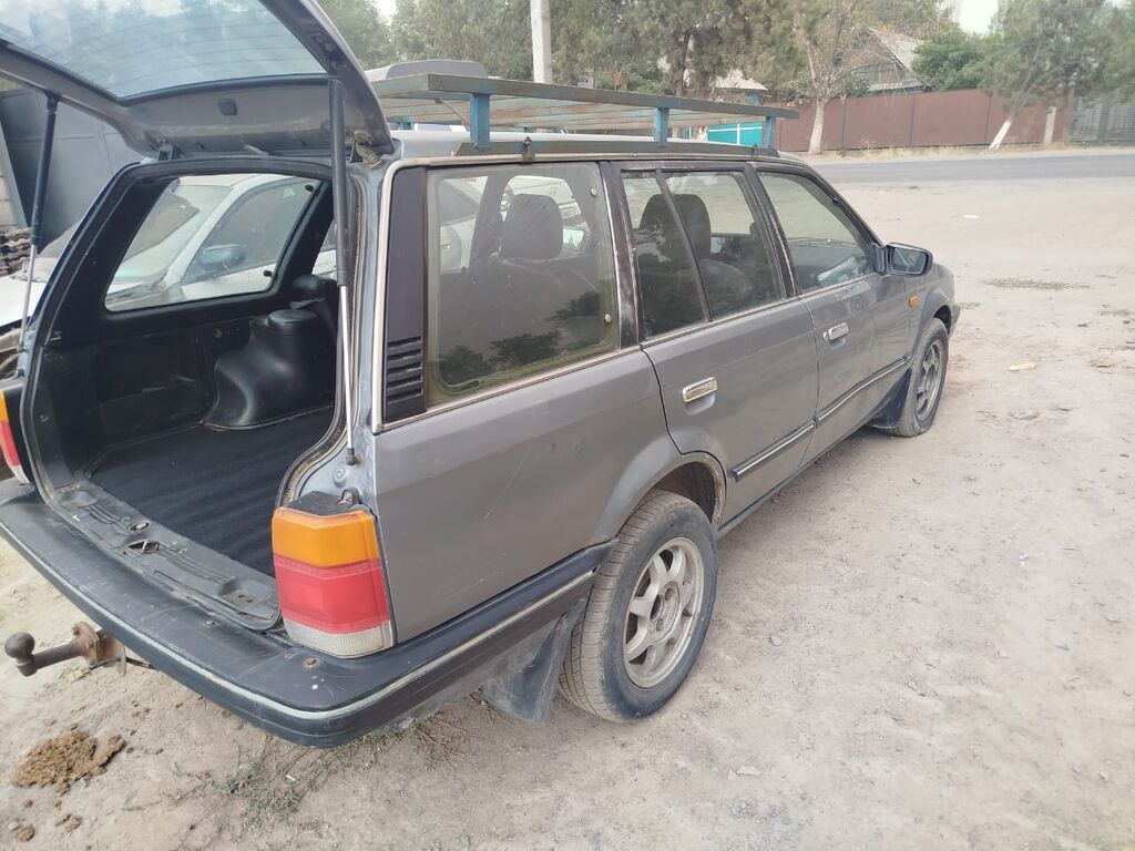 Mazda 323: 1990 г., Бензин, Универсал: фото 2