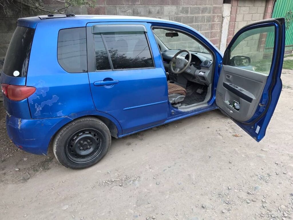 Mazda Demio: 2003 г., 1.3 л, Автомат, Бензин, Хэтчбэк: фото 6