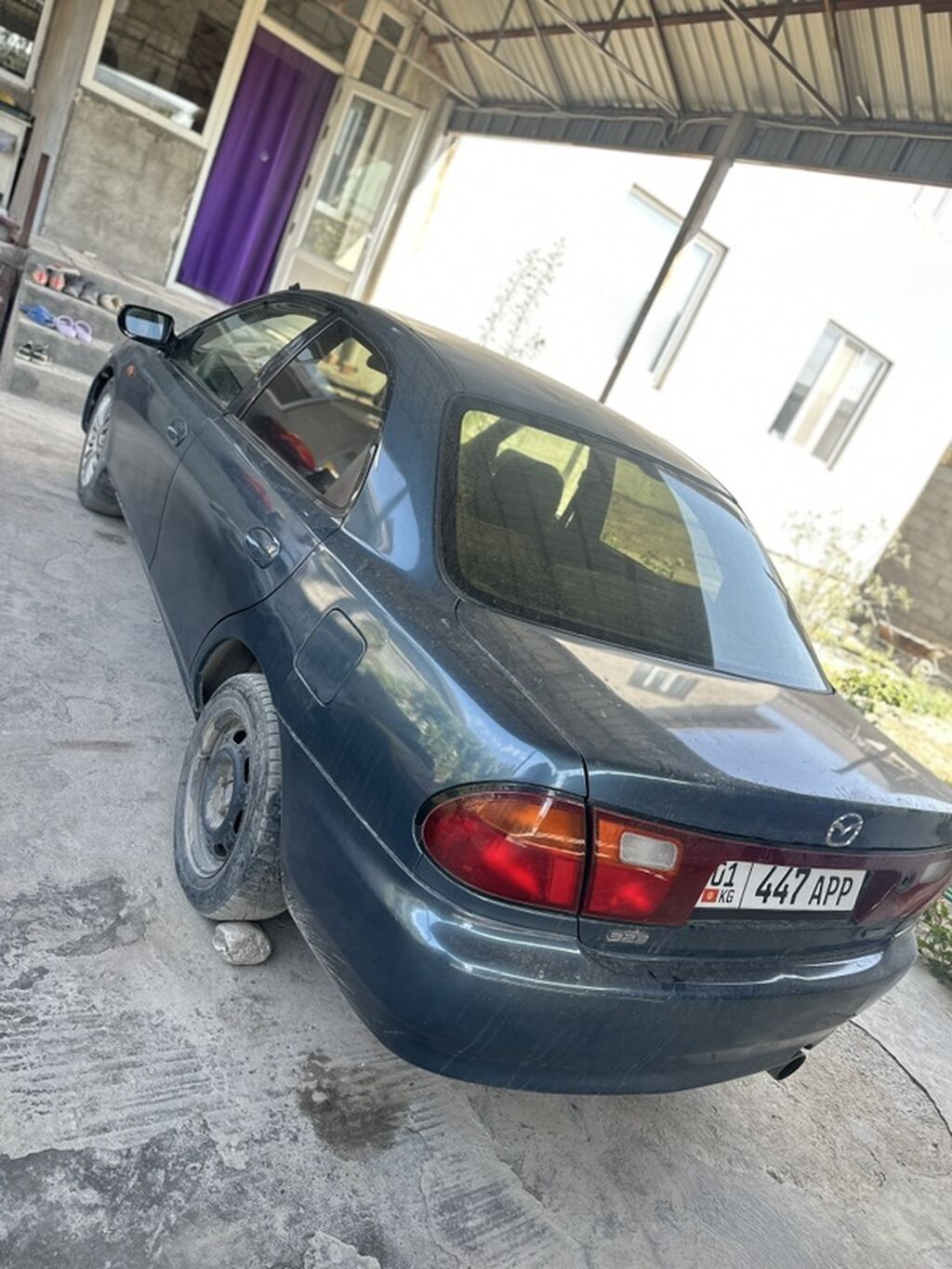 Mazda 323: 1997 г., 1.4 л, Механика, Бензин, Седан: фото 2
