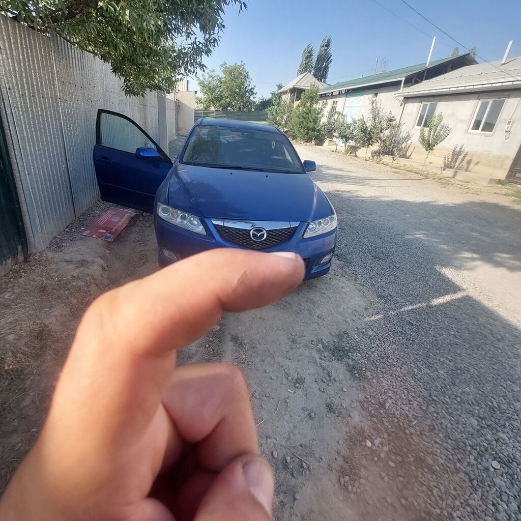 Mazda 6: 2005 г., 1.8 л, Механика, Седан: фото 4